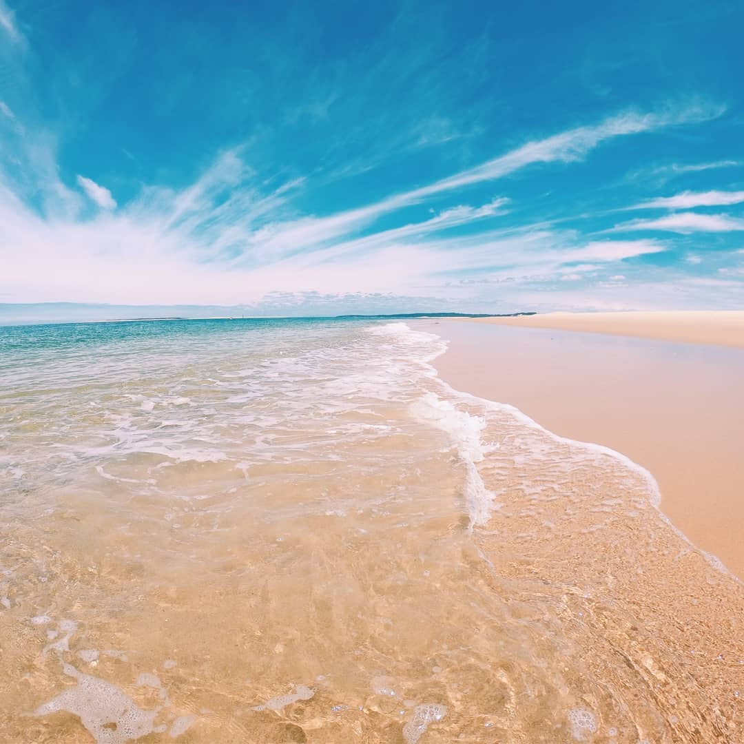 plage banc d'Arguin, ciel bleu, eau translucide